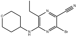 3-bromo-6-etyl-5-((tetrahydro-2H-pyran-4-yl)amino)pyrazine-2-carbonitrile